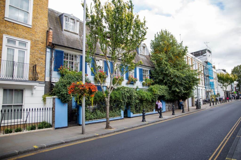 A row of British houses with fences